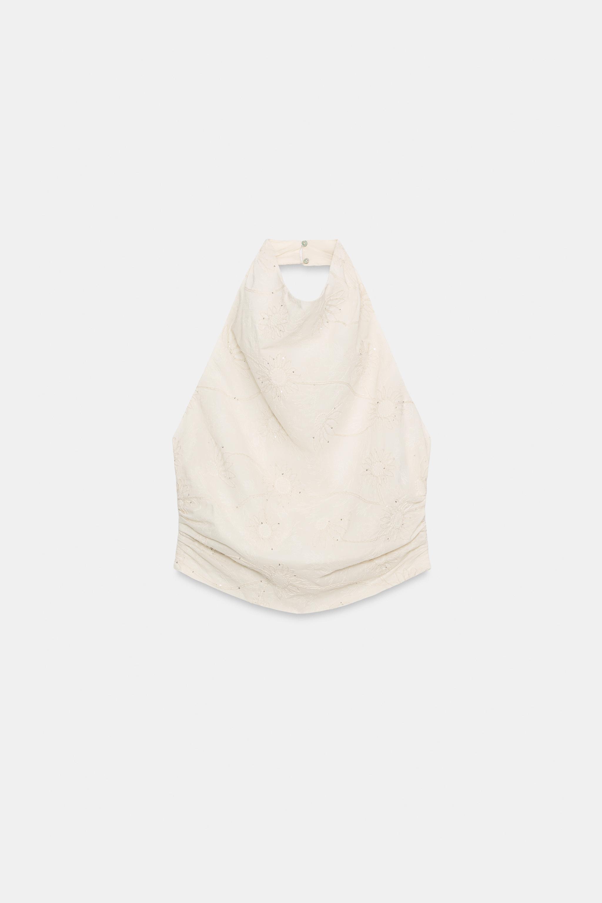 TOP HALTER BRODÉ À PAILLETTES